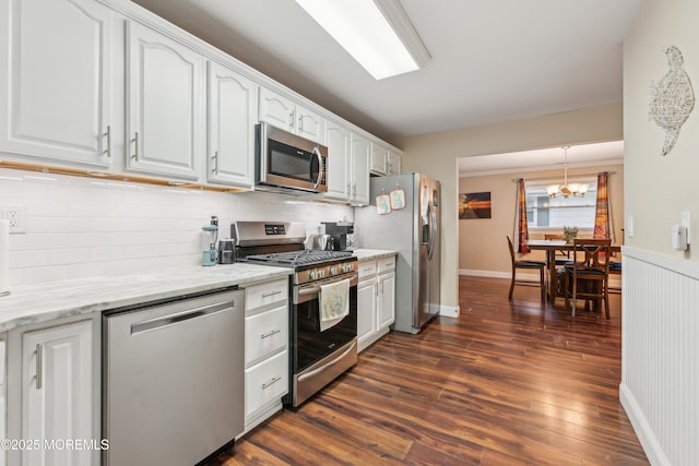 2024 Mount Carmel Blvd, Toms River, NJ 08753 - kitchen featuring an inviting chandelier, stainless steel appliances, tasteful backsplash, and white cabinets