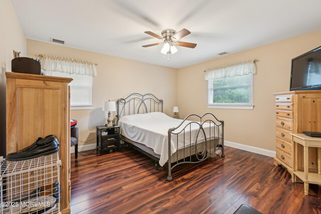 2024 Mount Carmel Blvd, Toms River, NJ 08753 - bedroom with dark wood finished floors, visible vents, baseboards, and a ceiling fan