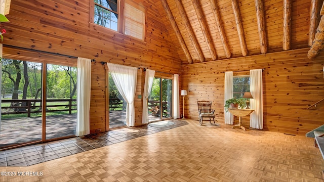 156 Baird Rd, Millstone, NJ 08535 - interior space featuring wood walls, a healthy amount of sunlight, high vaulted ceiling, and wooden ceiling