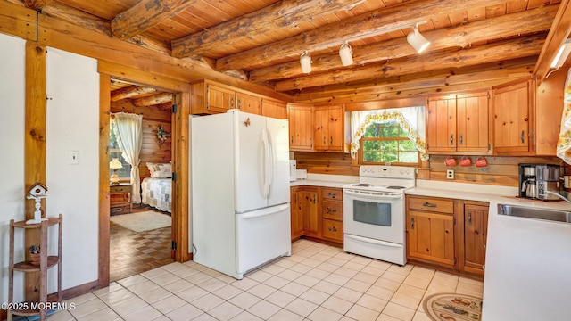 156 Baird Rd, Millstone, NJ 08535 - kitchen featuring white appliances, wooden ceiling, a sink, and light countertops