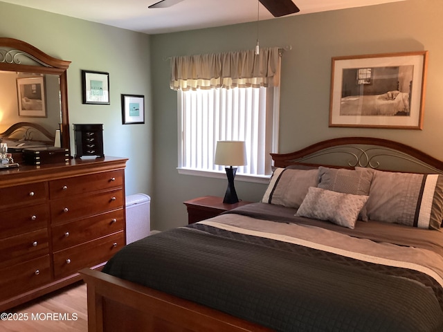 83 Campbell Ct, Freehold, NJ 07728 - bedroom with wood finished floors and ceiling fan