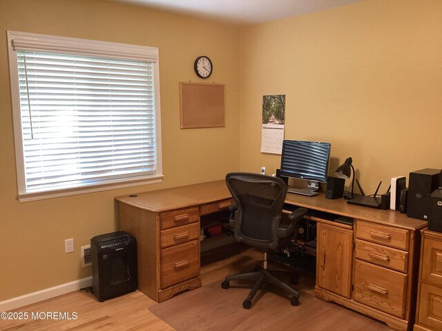 83 Campbell Ct, Freehold, NJ 07728 - office area with light wood-style flooring and baseboards