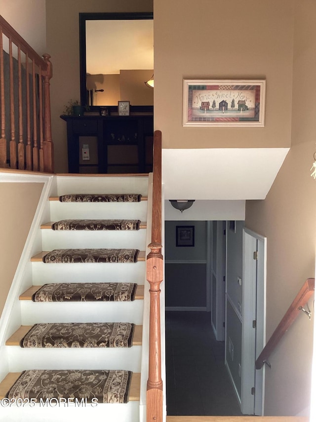 83 Campbell Ct, Freehold, NJ 07728 - staircase featuring tile patterned flooring