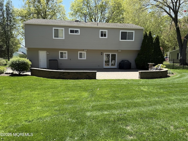 83 Campbell Ct, Freehold, NJ 07728 - rear view of property featuring french doors, a patio, and central AC unit