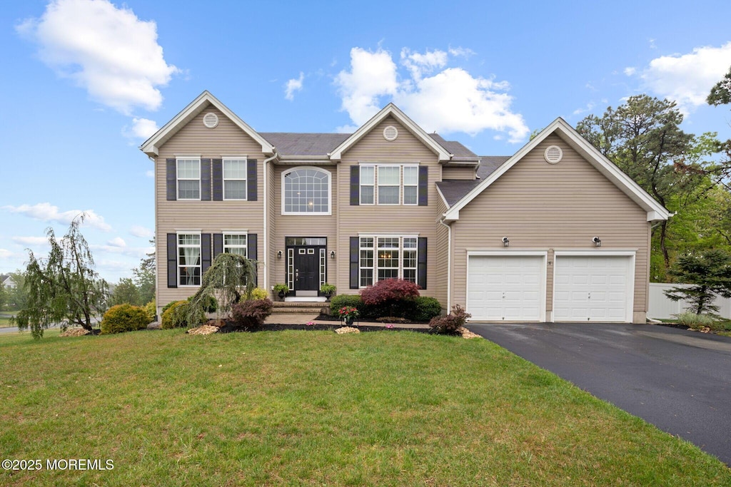 10 Jennifer Ln, Barnegat, NJ 08005 - colonial house with a front lawn and driveway