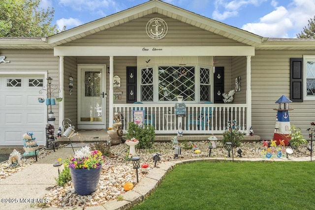 view of front facade featuring an attached garage, covered porch, and a front yard