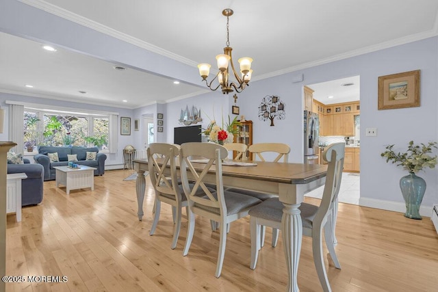 dining space featuring crown molding, a notable chandelier, light wood-style floors, recessed lighting, and baseboards