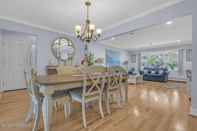 dining area with a baseboard heating unit, light wood finished floors, a notable chandelier, ornamental molding, and recessed lighting