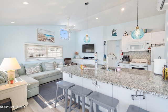 28 E Marlin Way, Lavallette, NJ 08735 - kitchen featuring white cabinets, a sink, white appliances, a ceiling fan, and open floor plan