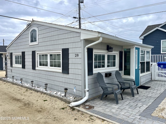 28 E Marlin Way, Lavallette, NJ 08735 - view of front facade featuring a patio