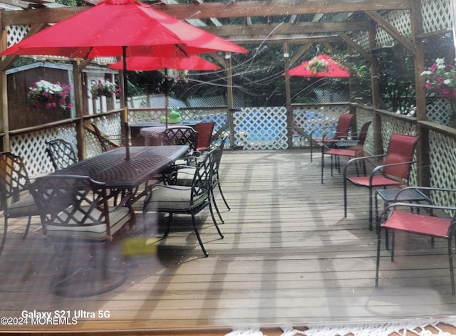 437 Harmony Rd, Jackson, NJ 08527 - wooden terrace with outdoor dining area and a pergola