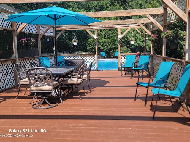 437 Harmony Rd, Jackson, NJ 08527 - deck with outdoor dining area and an outdoor pool