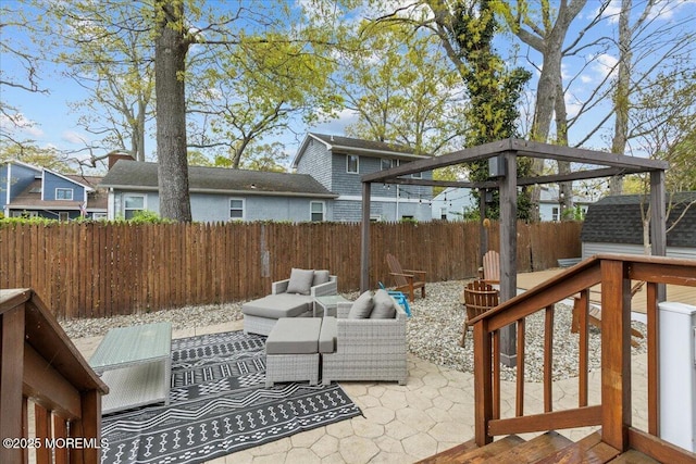view of patio / terrace with an outdoor hangout area and a fenced backyard