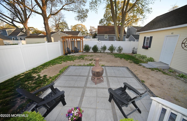 view of yard with a patio and a fenced backyard
