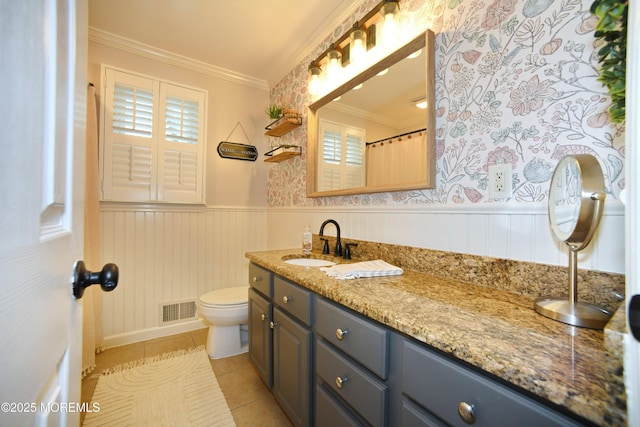 full bathroom featuring toilet, crown molding, visible vents, tile patterned flooring, and vanity