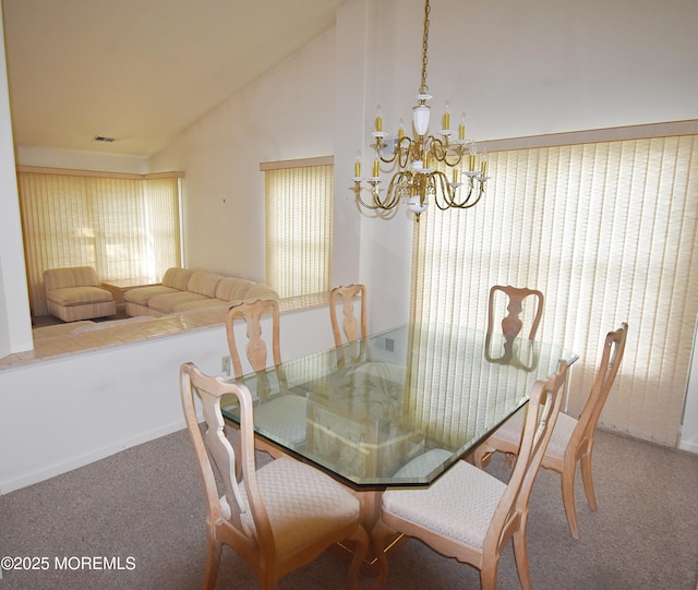 126 Cardigan Ct, Manchester, NJ 08759 - carpeted dining area with a chandelier and vaulted ceiling
