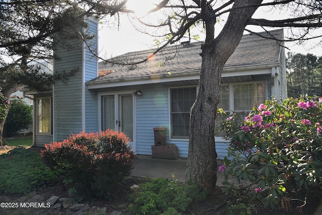 126 Cardigan Ct, Manchester, NJ 08759 - view of front of property with a chimney