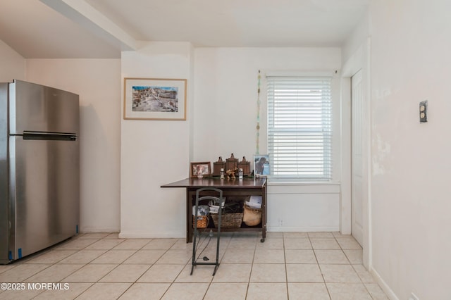1118 Jeffrey St, Asbury Park, NJ 07712 - dining room with healthy amount of natural light, light tile patterned flooring, and baseboards