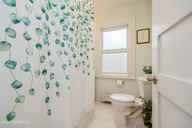 1118 Jeffrey St, Asbury Park, NJ 07712 - bathroom featuring toilet, a shower with curtain, and a baseboard heating unit