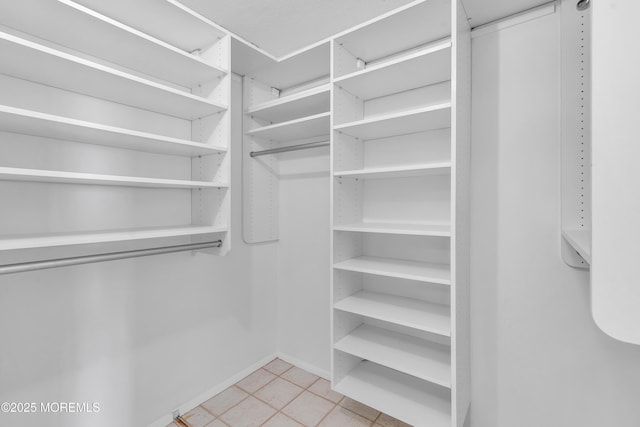 55 Ocean Ave Unit 3L, Monmouth Beach, NJ 07750 - spacious closet featuring light tile patterned floors