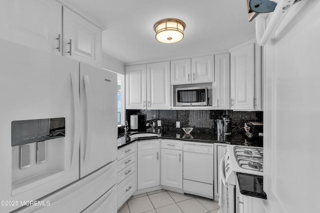 55 Ocean Ave Unit 3L, Monmouth Beach, NJ 07750 - kitchen with white appliances, a sink, and white cabinets
