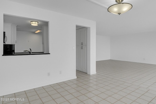 55 Ocean Ave Unit 3L, Monmouth Beach, NJ 07750 - empty room featuring baseboards