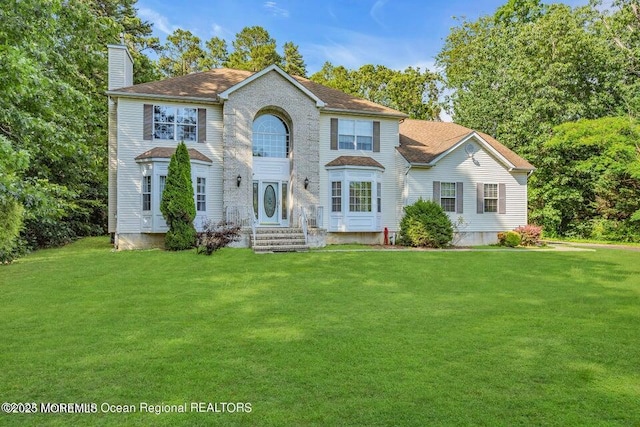 3688 Ridgeway Rd, Manchester, NJ 08759 - colonial-style house featuring a chimney and a front yard