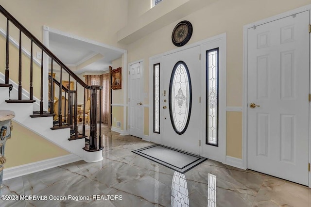 3688 Ridgeway Rd, Manchester, NJ 08759 - entryway featuring marble tiled floors, stairs, and baseboards