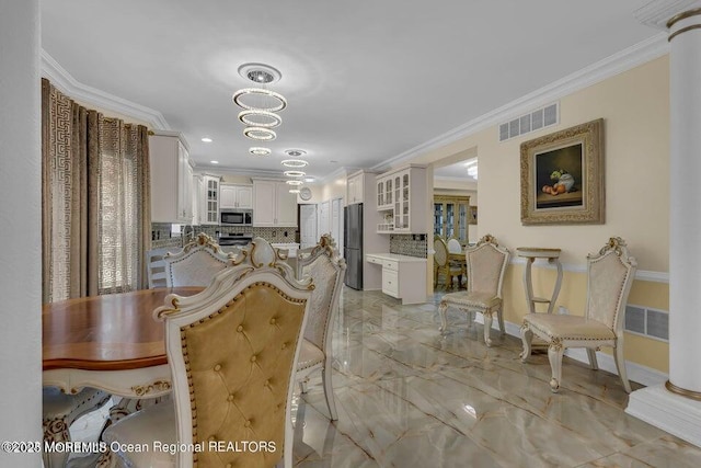3688 Ridgeway Rd, Manchester, NJ 08759 - dining area with ornamental molding, light marble finish floors, and baseboards