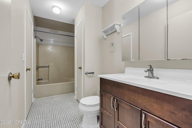 full bath with toilet, vanity, bathing tub / shower combination, and tile patterned floors