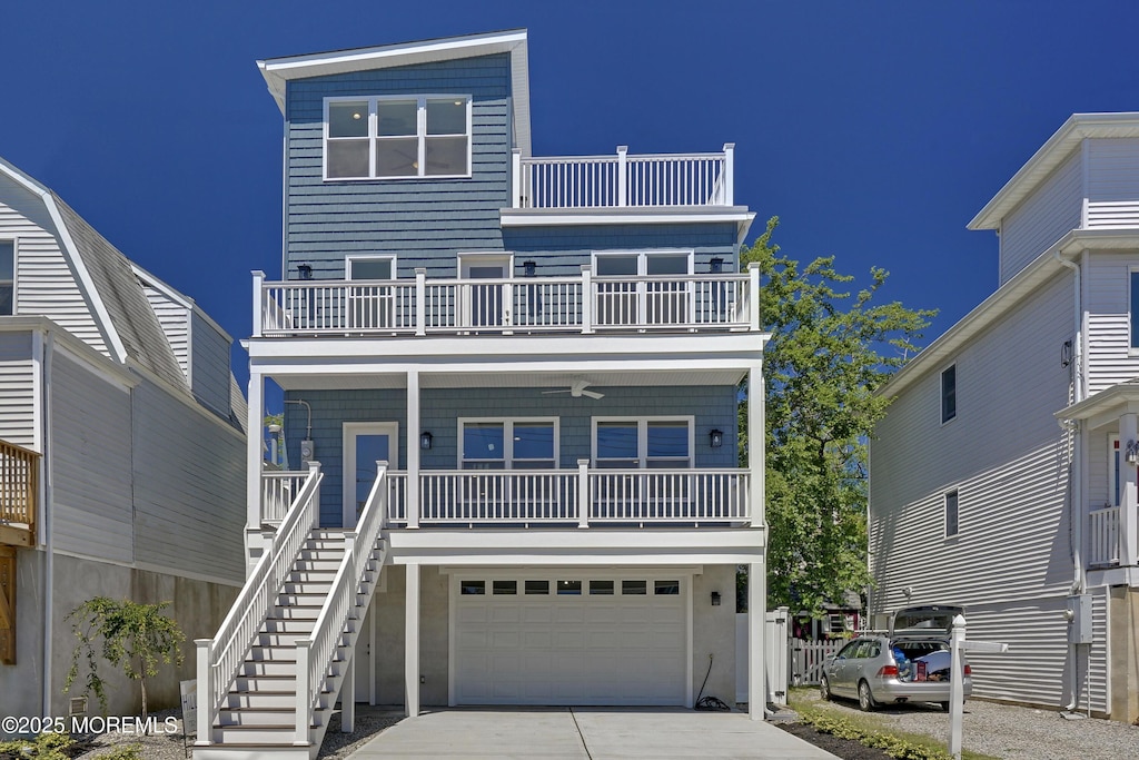 14 Barberie Ave, Highlands, NJ 07732 - raised beach house with a balcony, driveway, a garage, covered porch, and stairway