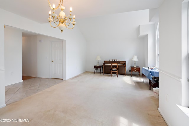 12 Rye Ct, Jackson, NJ 08527 - carpeted dining area featuring lofted ceiling, tile patterned flooring, and a chandelier
