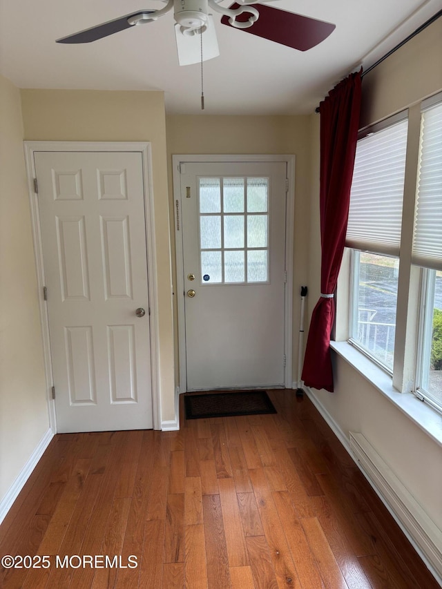 68D Yorktowne Pkwy, Whiting, NJ 08759 - doorway with a ceiling fan, a wealth of natural light, baseboards, and light wood-style flooring