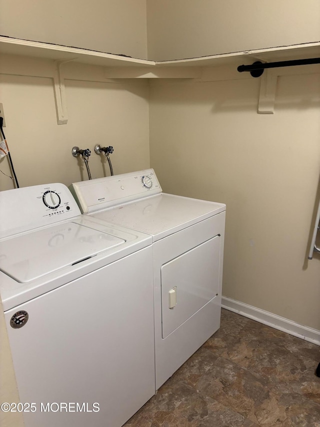 68D Yorktowne Pkwy, Whiting, NJ 08759 - laundry area with stone finish flooring, baseboards, washing machine and dryer, and laundry area