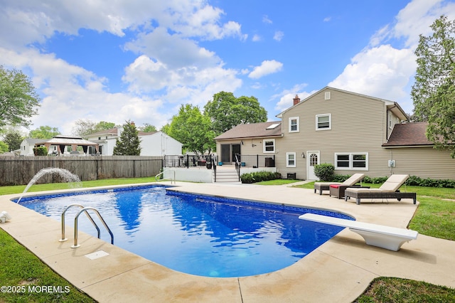 2 Nassau Pl, Middletown, NJ 07748 - view of swimming pool with a wooden deck, a patio area, and a diving board
