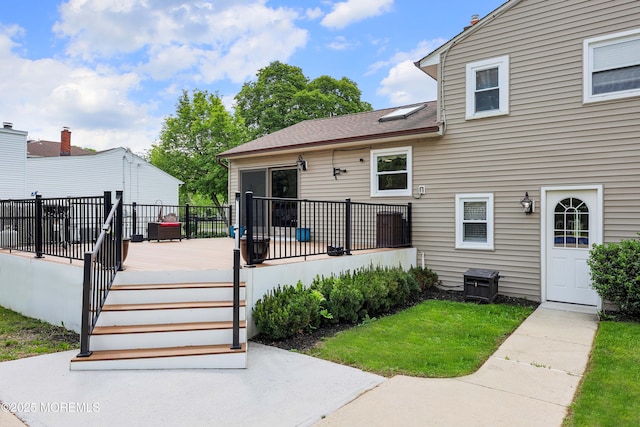 2 Nassau Pl, Middletown, NJ 07748 - back of property featuring a deck and a shingled roof