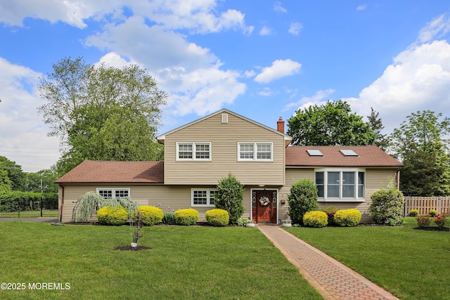 2 Nassau Pl, Middletown, NJ 07748 - tri-level home featuring a chimney and a shingled roof