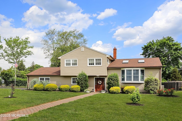 2 Nassau Pl, Middletown, NJ 07748 - tri-level home with a chimney and a shingled roof