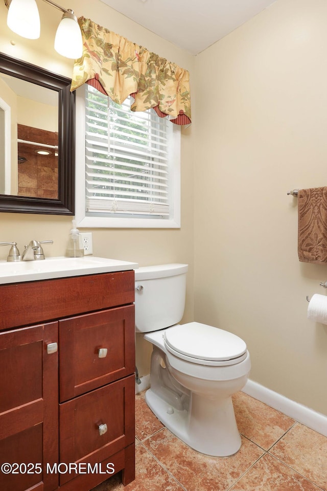 2 Nassau Pl, Middletown, NJ 07748 - bathroom with toilet, vanity, tile patterned floors, and baseboards