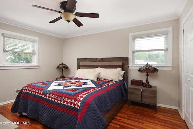 2 Nassau Pl, Middletown, NJ 07748 - bedroom featuring wood finished floors, crown molding, baseboards, a ceiling fan, and a closet