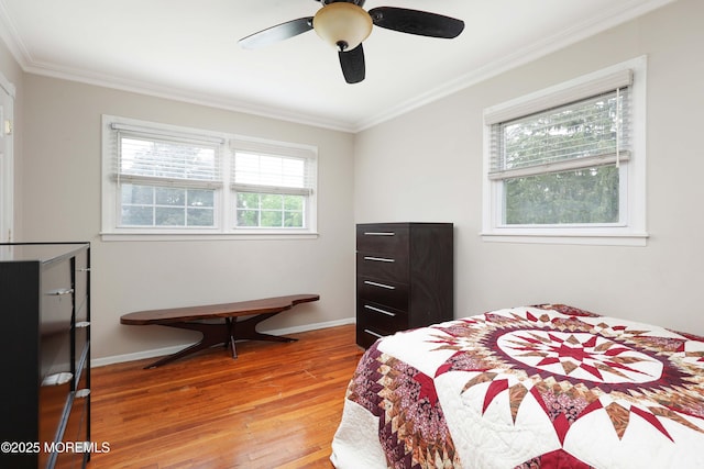 2 Nassau Pl, Middletown, NJ 07748 - bedroom with light wood finished floors, ornamental molding, baseboards, and ceiling fan