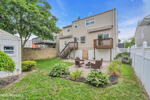 rear view of property with a patio area, stairway, and a wooden deck