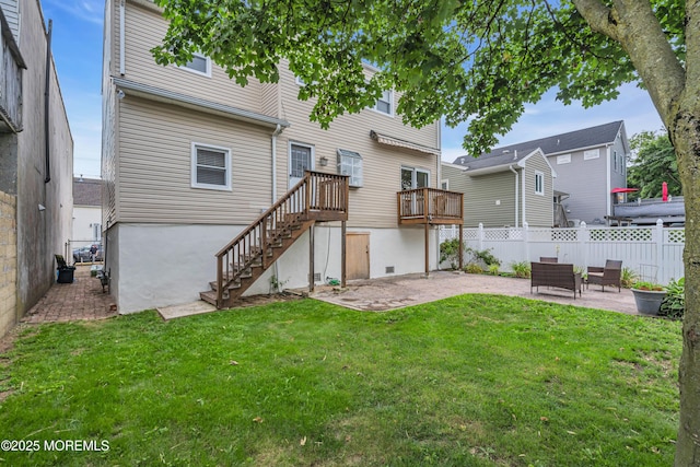 back of house featuring stairs, a patio area, and a deck