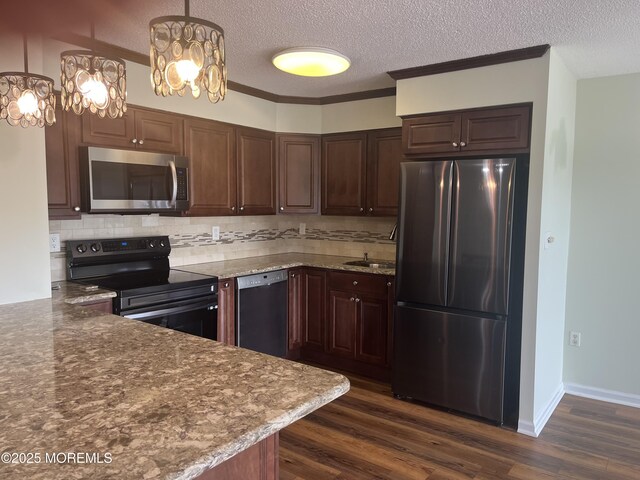 1 Scenic Dr Unit 207, Highlands, NJ 07732 - kitchen with appliances with stainless steel finishes, tasteful backsplash, dark wood-style floors, dark brown cabinets, and a textured ceiling