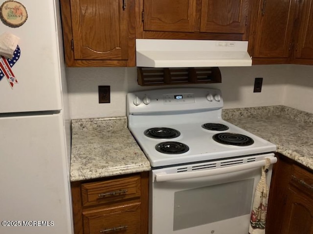 11B Walnut Rd, Manahawkin, NJ 08050 - kitchen featuring white appliances, under cabinet range hood, and light countertops