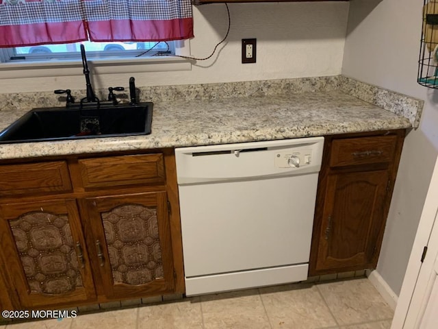 11B Walnut Rd, Manahawkin, NJ 08050 - kitchen featuring white dishwasher, a sink, and light countertops