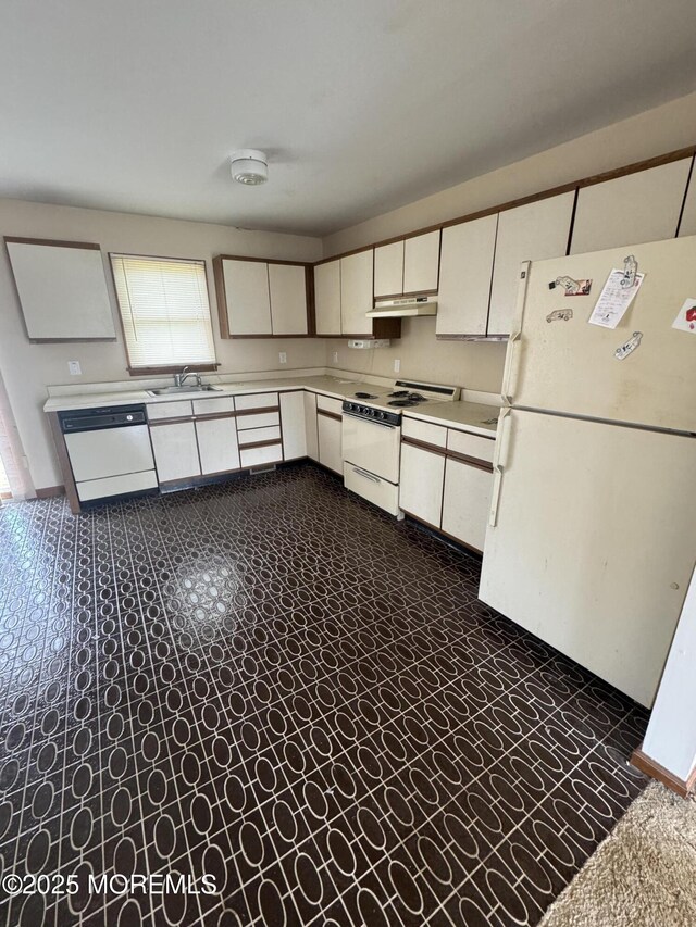 kitchen featuring a sink, white appliances, under cabinet range hood, light countertops, and white cabinets
