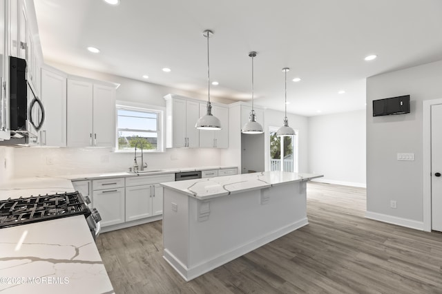 204 Morningside Ave, Union Beach, NJ 07735 - kitchen featuring a sink, stainless steel appliances, healthy amount of natural light, light wood finished floors, and recessed lighting
