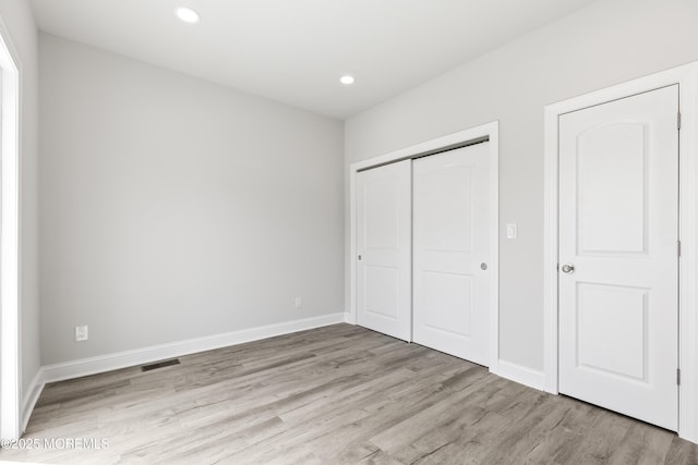 204 Morningside Ave, Union Beach, NJ 07735 - unfurnished bedroom with light wood-type flooring, a closet, recessed lighting, and baseboards