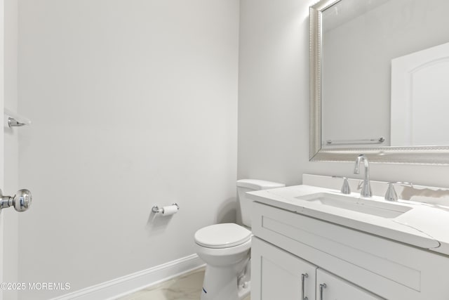 204 Morningside Ave, Union Beach, NJ 07735 - half bathroom featuring vanity, baseboards, marble finish floors, and toilet
